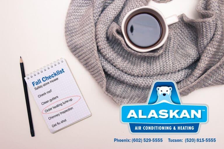 Fall checklist next to cup of coffee with scarf wrapped around it, view from top down, Alaskan Air Conditioning and Heating logo and contact phone numbers
