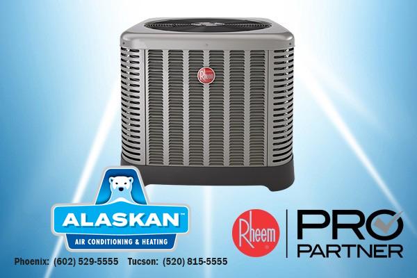 Rheem AC unit with Rheem Pro Partner logo and Alaskan Air Conditioning and Heating logo and contact phone numbers